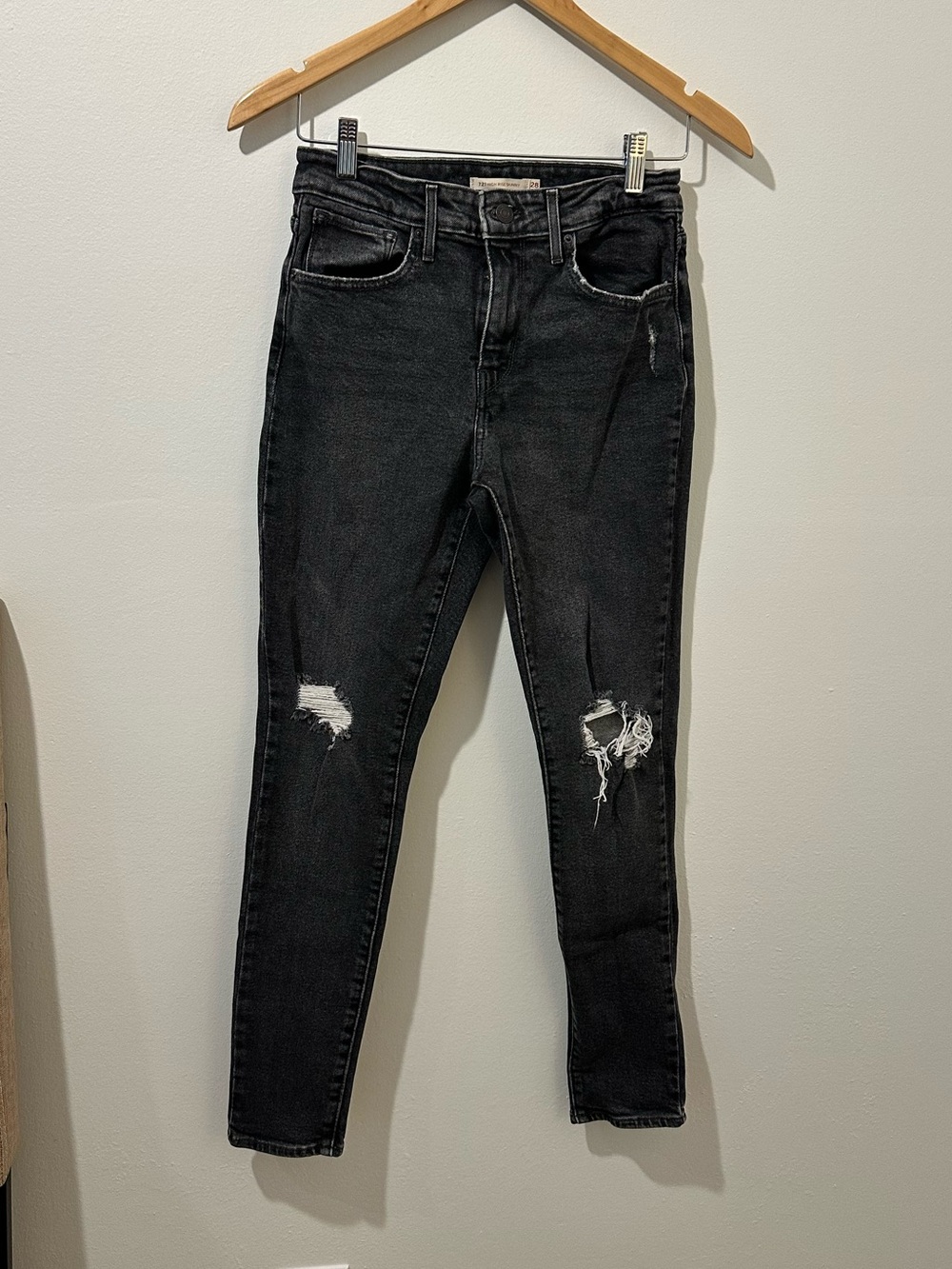 High-Rise Black Skinny Jeans with Knee Distress